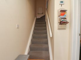 A staircase leading upstairs in The Cosy Haven in Malton