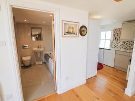 A bathroom with a sink and bathtub at Wayside in Moreton-in-Marsh