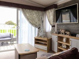 A living room with decorative elements at Marton Mere Westminster in Blackpool