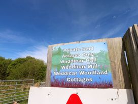 A sign indicating private land access at Weddicar Hall in Frizington