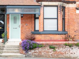 A door with a window and flowers at 38 Ashville Avenue Scarborough