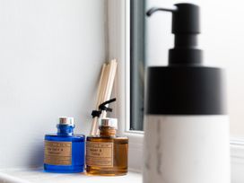 Bottles and reeds on a windowsill at 38 Ashville Avenue Scarborough
