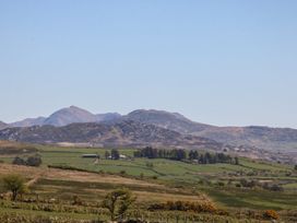 A view of mountains and fields at Cefnbron in Caernarfon