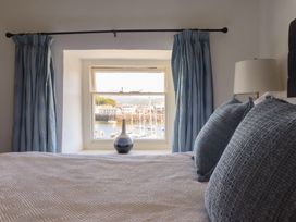 A bedroom with a view of the harbor at Cnicht View in Porthmadog