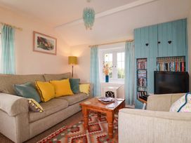 A living room with a sofa and coffee table at The Granary in 