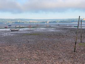 An area with boats on water at low tide at Tower View Cottage in Lympstone