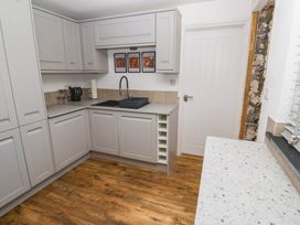 A kitchen with cabinets, sink, and countertop at The Lookout in Redruth