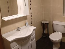 A bathroom with a sink and toilet at Sliabh League Mountain Lodge TEILEANN near Kilcar, County Donegal
