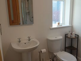 A bathroom with a sink and toilet at Sliabh League Mountain Lodge TEILEANN near Kilcar, County Donegal