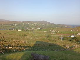 A landscape view with houses and fields at Sliabh League Mountain Lodge TEILEANN near Kilcar, County Donegal