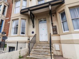 An entrance with a door and steps at Abbey Court in Whitby