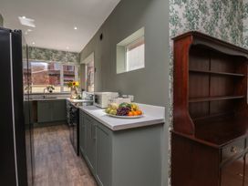 A kitchen with a countertop and appliances at Lansdowne Grange in Bridlington