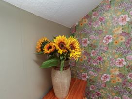 A vase with sunflowers on a table at Lansdowne Grange in Bridlington