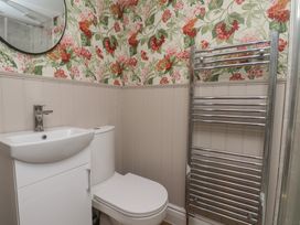 A bathroom with a sink and toilet at Lansdowne Grange in Bridlington