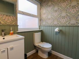 A bathroom with a sink and toilet at Lansdowne Grange in Bridlington