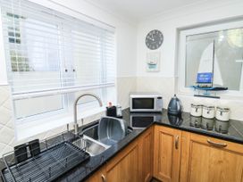 A kitchen with a sink and appliances at 2 Inglewood Apartments in Dartmouth
