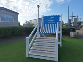 A deck chair with steps at Haven Seashore, Great Yarmouth