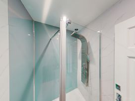 A shower with glass door and panel at 44 Norwood Street Scarborough