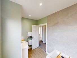 A bathroom with a sink and towel rack at 44 Norwood Street Scarborough