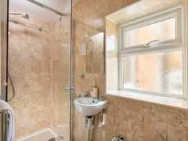 A bathroom with a sink and shower at 125 Columbus Ravine Scarborough