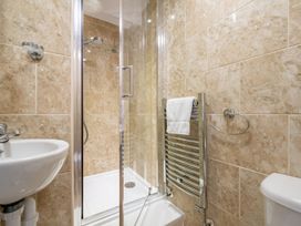 A bathroom with shower and sink at 125 Columbus Ravine in Scarborough