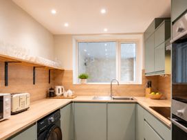 A kitchen with utensils and appliances at 125 Columbus Ravine, Scarborough