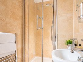 A bathroom with shower and sink at 125 Columbus Ravine, Scarborough