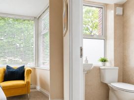 A bathroom with a sink and toilet at 125 Columbus Ravine in Scarborough