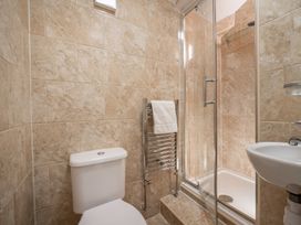 A bathroom with a toilet and shower at 127 Columbus Ravine Scarborough