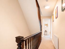 A staircase and handrail in a hallway at 127 Columbus Ravine Scarborough