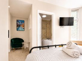A bedroom with a bed and television at 127 Columbus Ravine Scarborough