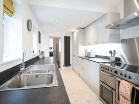 A kitchen with sink and oven at 23 Trafalgar Road Scarborough