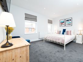 A bedroom with a bed and bedside table at 23 Trafalgar Road in Scarborough
