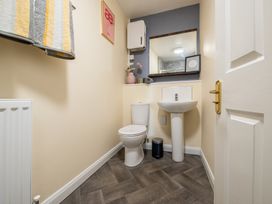 A bathroom featuring a toilet and sink at 53A Hampton Road Scarborough