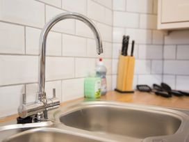 A kitchen with a sink and faucet at 53 Hampton Road Scarborough