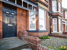 An entrance door with windows at 46 Ashville Avenue in Scarborough