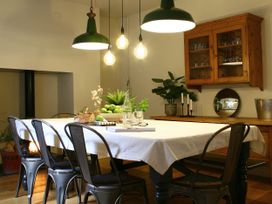 A dining room with a table and chairs at Beautiful 6Bed Sleeps 12 Stunning Views in Lynton