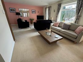 A living room with sofas and a coffee table at River Tamar Couples Retreat Dog Friendly Newbridge