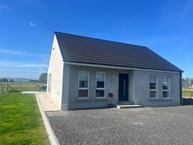 A house with windows and a door in Magilligan near Limavady