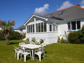 A house with a garden and outdoor seating at House Sleeps 8 Close to Beach Free parking in Mullion