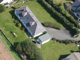 An aerial view of a house and garden at House Sleeps 8 Close to Beach Free parking, Mullion