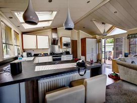 A kitchen with cabinets and appliances at Dunoon 3Bed Lodge Sleeps 6 Pet Friendly near Dunoon