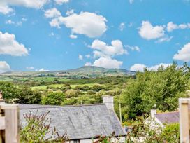 A view of a mountain and greenery at Cottage Sleeps 5 with Parking and Garden in Carreglefn