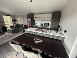 A kitchen and living room with a dining area at Malton 2Bed Lodge Sleeps 4 Pet Friendly in Malton