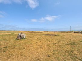 An outdoor area featuring an anchor and stone near the sea at 3 Bed Caravan Sleeps 8 Pets Garden Parking in Hull