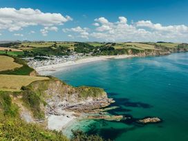 A coastal view with beach and sea at a location in Builth Wells
