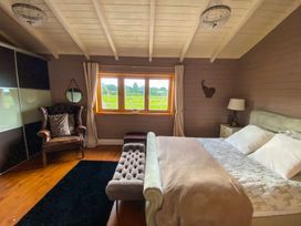 A bedroom with a bed and window at the property