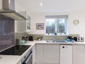 A kitchen with a sink and appliances at 1Bed Coastal Retreat Sleeps 2 Parking Wifi Bude