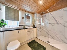 A bathroom with a sink and shower at Alpaca Farm Valley Views Sleeps 4 Parking Pets in Husthwaite