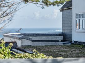 A view of the sea from a building overlooking the coast at 1 Bedroom Apartment Sleeps 2 Pets Welcome in Carbis Bay